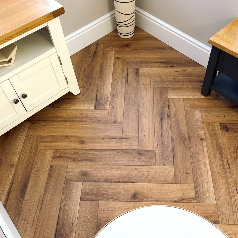 Embrace Herringbone Laminate Flooring Traditional Oak 12mm  - image 4