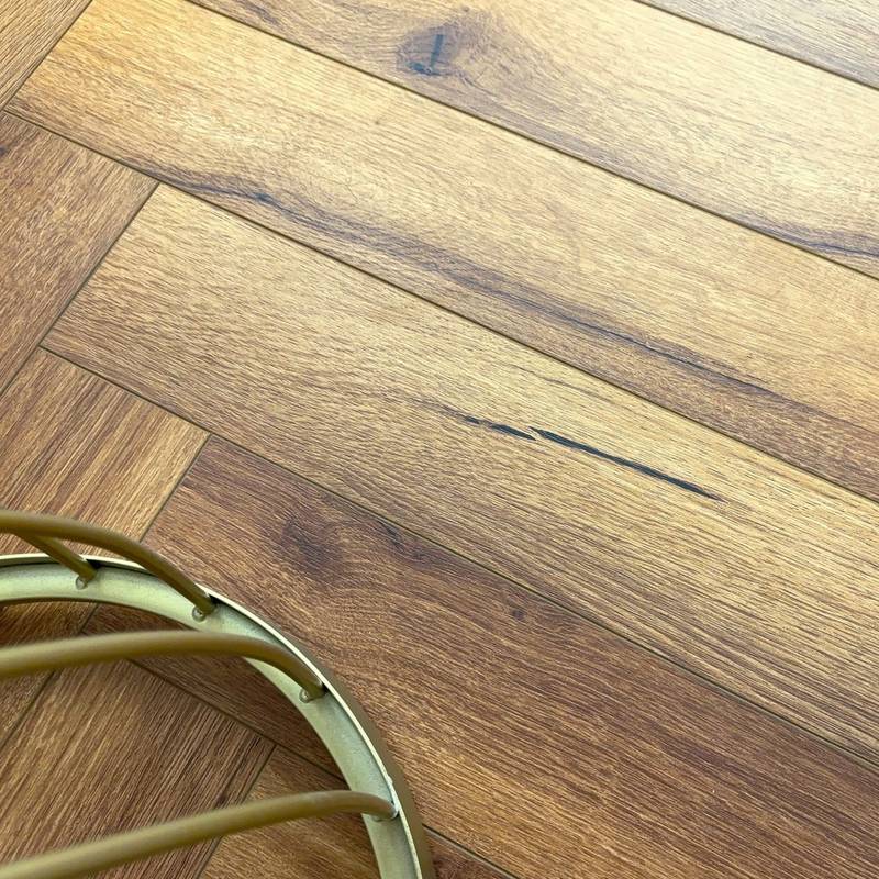 Embrace Herringbone Laminate Flooring Traditional Oak 12mm  - image 3